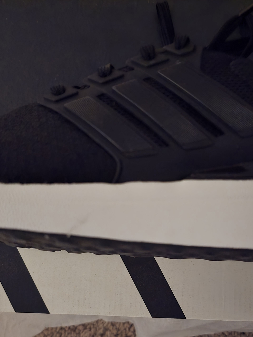 Black Athletic Sneaker with White Midsole
